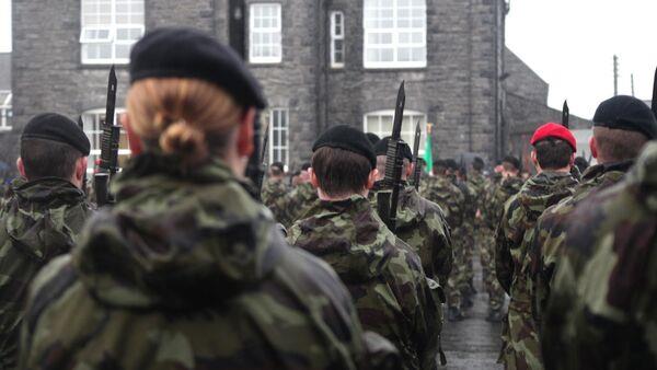 Probe into claim soldiers were 'kept in cages' forced to fight each other by armed officer 