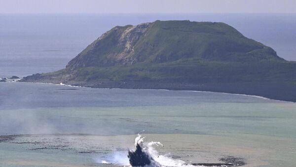 New island emerges after undersea volcano erupts off coast of Japan