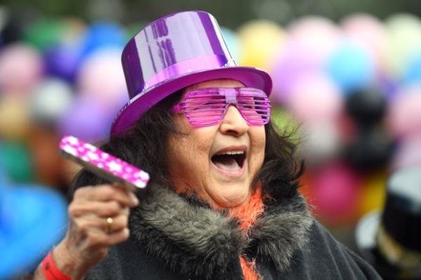 Eileen Gutierrez enjoys the Noon Year’s Eve event at the...
