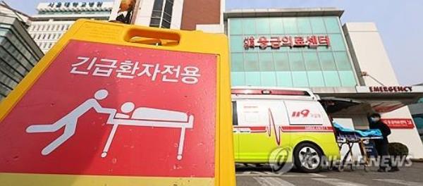 An ambulance parks at an emergency center in a general hospital in Seoul on March 3, 2024. (Yonhap)