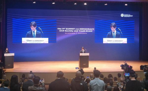 Kim Il-hyeok, a North Korean defector, delivers his speech at the opening ceremony of the civil society and youth event of the third Summit for Democracy at a hotel in Seoul on March 19, 2024. (Yonhap)
