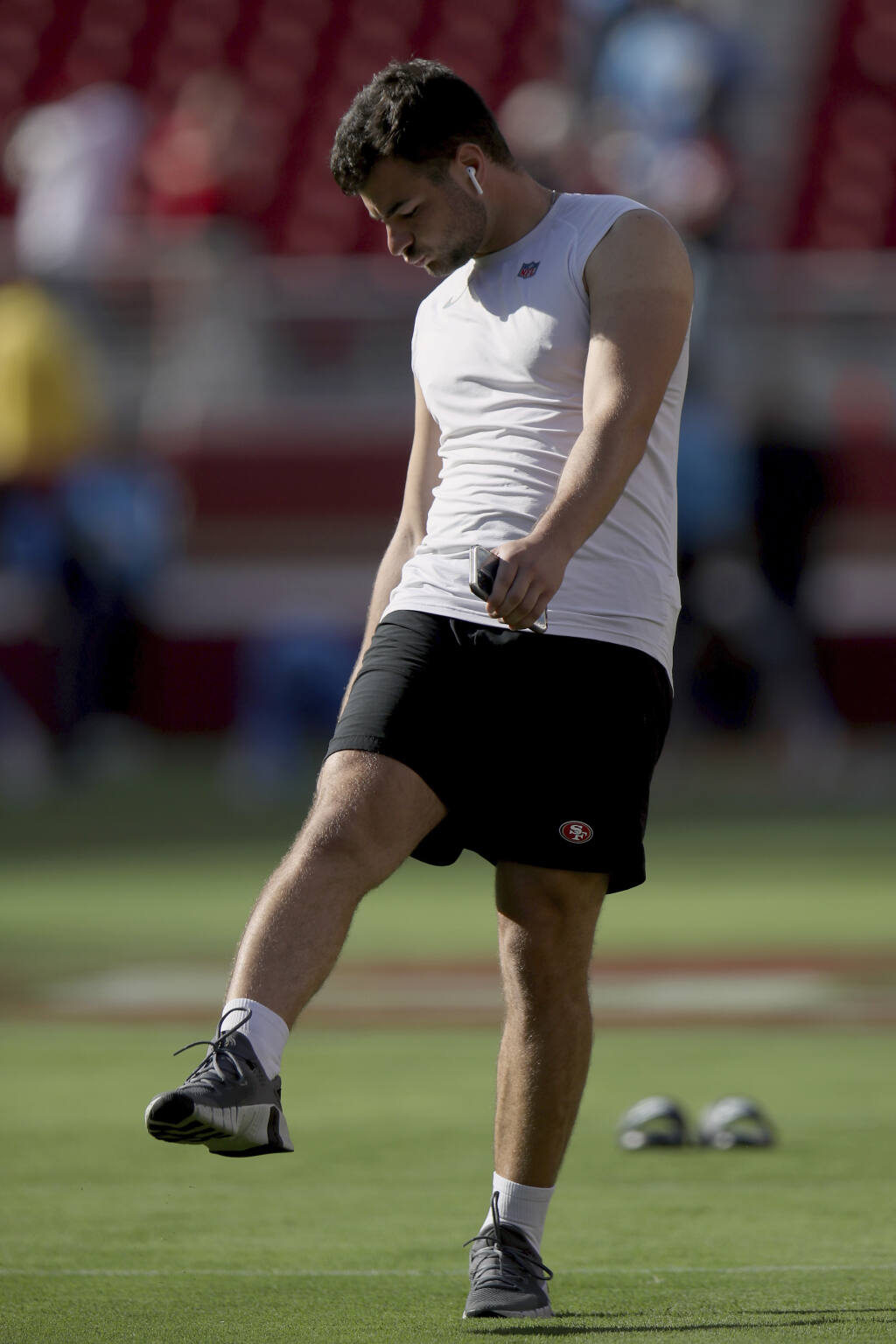 San Francisco 49ers place kicker Jake Moody (4) walks on the field before an NFL football game against the Los Angeles Chargers, Friday, Aug. 25, 2023, in Santa Clara, Calif. (AP Photo/Scot Tucker)