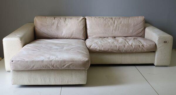 A leather L-shaped sofa by Fendi at deVeres.