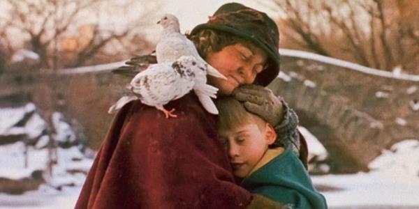 Macaulay Culkin as Kevin, hugging Brenda Fricker's Pigeon Lady in Central Park in Home Alone 2
